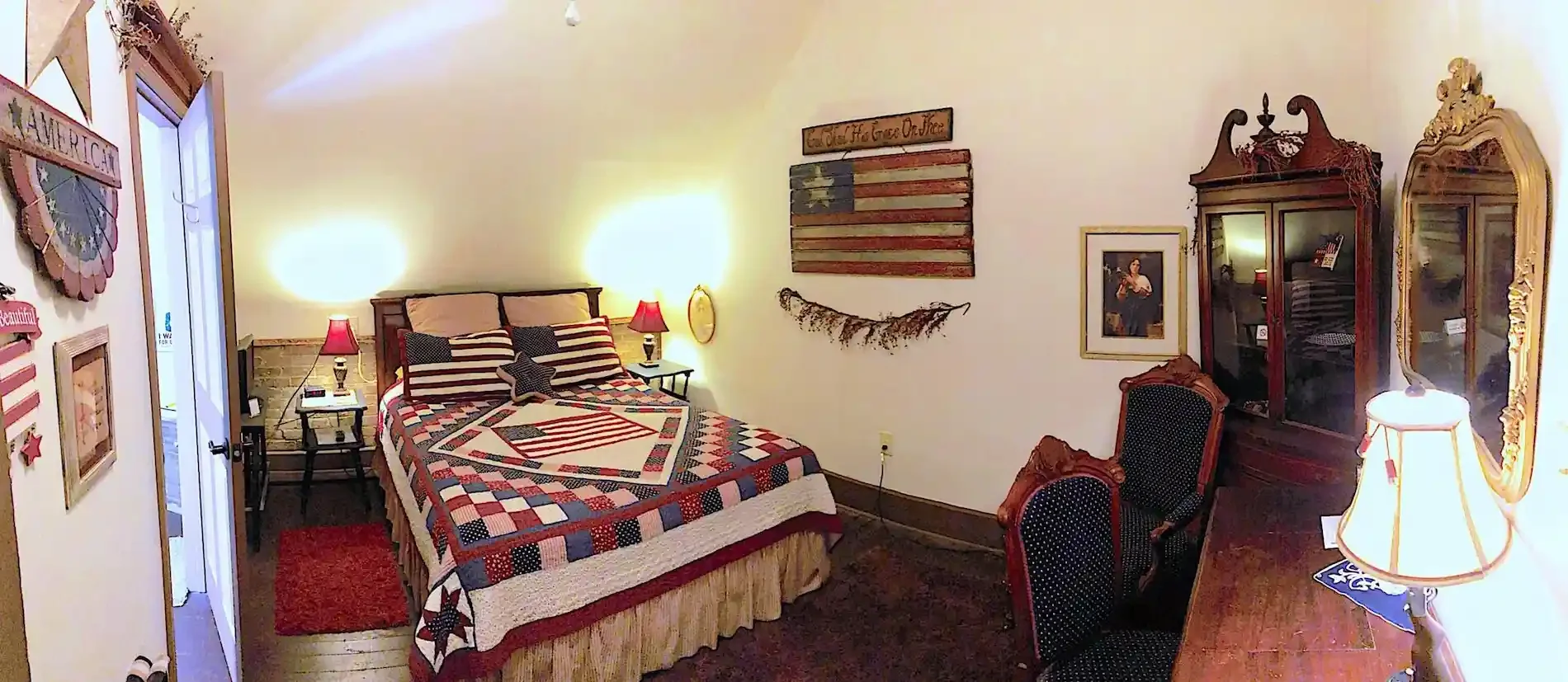 Bedroom with patriotic quilt and decorations